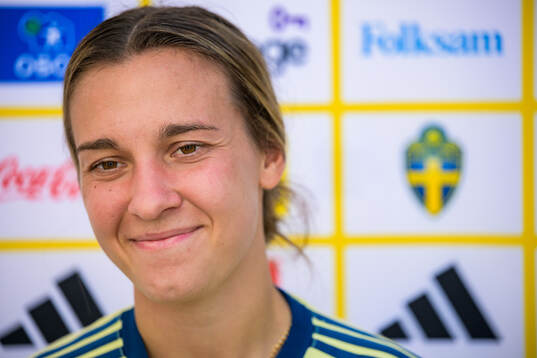 Julia Zigiotti Olme is interviewed by the media