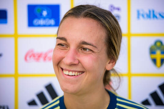 Julia Zigiotti Olme is interviewed by the media