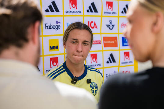 Julia Zigiotti Olme is interviewed by the media