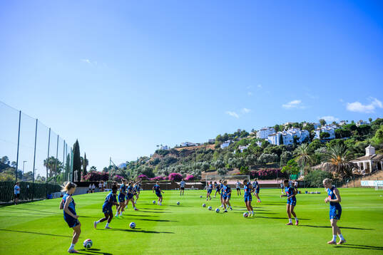 Players of the Swedish women's national football team warm