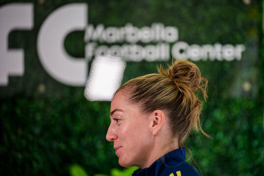 Linda Sembrant is interviewed by the media at a press event