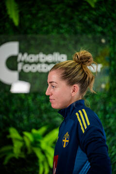 Linda Sembrant is interviewed by the media at a press event
