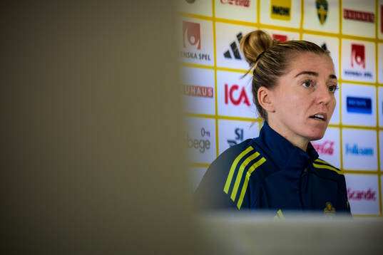 Linda Sembrant is interviewed by the media at a press event