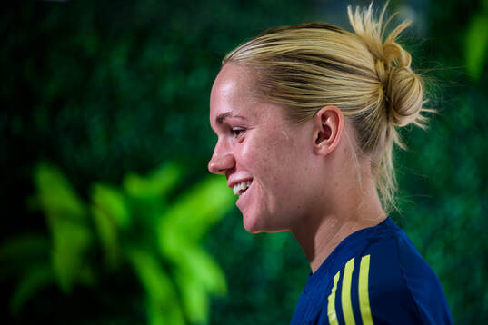 Hanna Lundkvist is interviewed by the media at a press