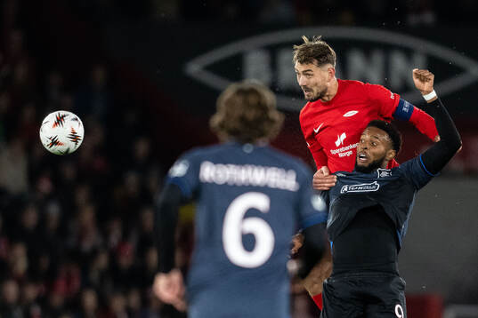 Fredrik Pallesen Knudsen of Brann and Youssef Chermiti of