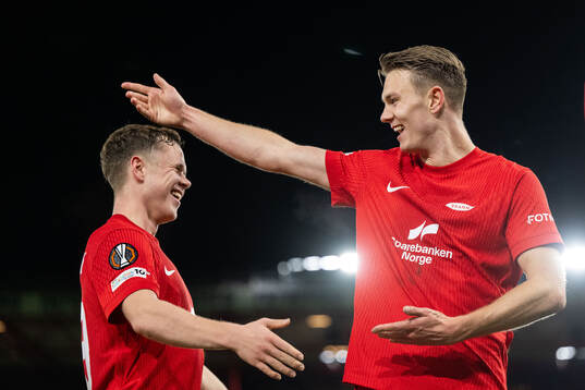 Emil Kornvig of Brann celebrates with Eggert Aron