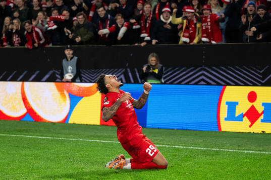 Noah Jean Holm of Brann celebrates