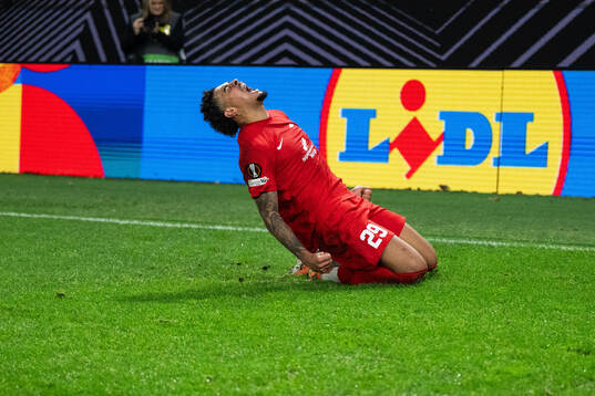 Noah Jean Holm of Brann celebrates