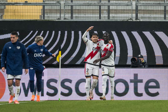 Andrej Ratiu of Rayo Vallecano celebrates with Pathe Ciss