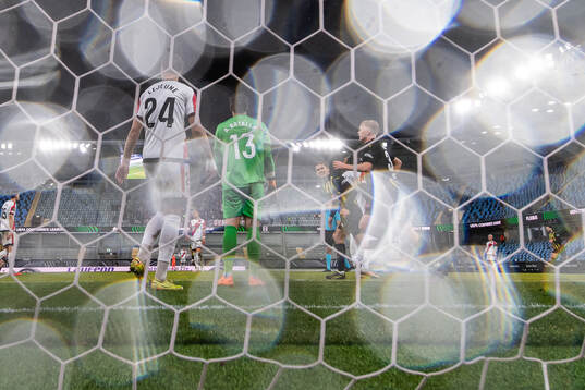 Florian Lejeune and goalkeeper Augusto Batalla of Rayo