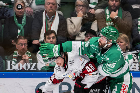 Malmö Redhawks Lauri Pajuniemi och Rögles Mark Friedman