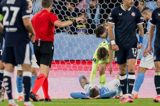 Pontus Jansson and goalkeeper Melker Ellborg of Malmö FF