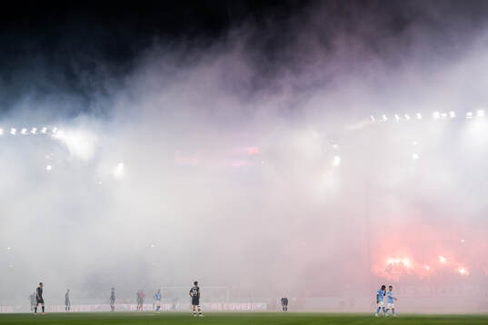 Game interruption due to smoke from flares