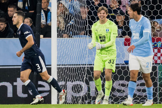 goalkeeper Melker Ellborg of Malmö FF celebrates