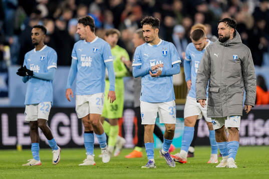 Adrian Skogmar and Sead Haksabanovic of Malmö FF look