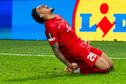 Noah Jean Holm of Brann celebrates