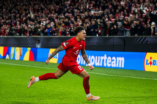 Noah Jean Holm of Brann celebrates