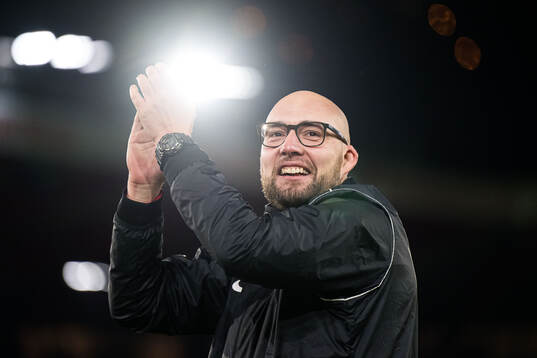 Assistent coach Jonathan Hartmann of Brann celebrates