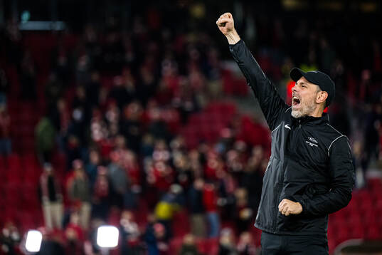 Head coach Freyr Alexandersson of Brann celebrates