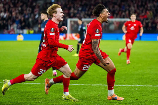 Noah Jean Holm of Brann celebrates