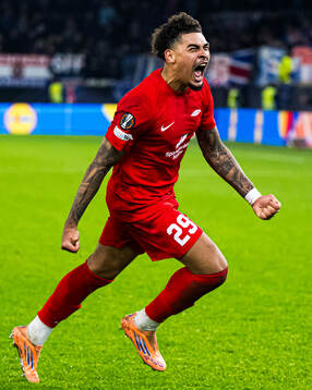 Noah Jean Holm of Brann celebrates