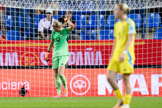 Goalkeeper Jennifer Falk of Sweden looks dejected
