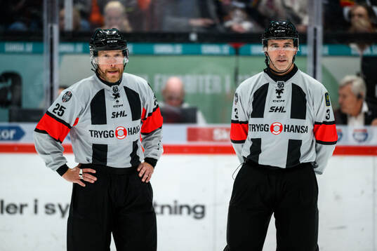 Domare Tobias Björk och Domare Linus Öhlund