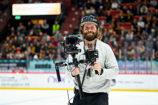 Åkande TV-fotograf