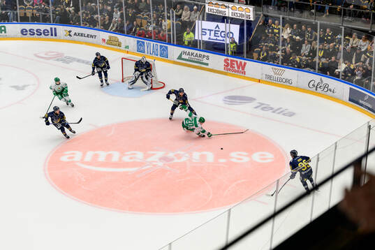 HV71s Andreas Borgman och Rögles Marwin Jarbsjö