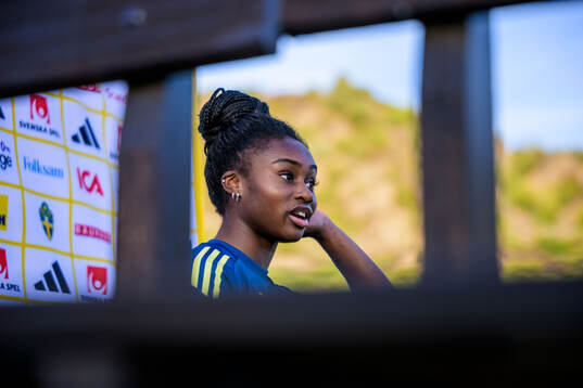 Monica Jusu Bah is being interviewed by the media of the
