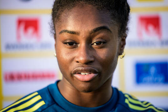 Monica Jusu Bah is being interviewed by the media of the