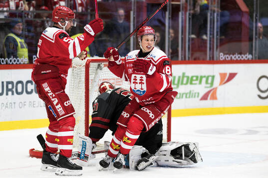 Timrås Anton Lander och Eddie Genborg jublar
