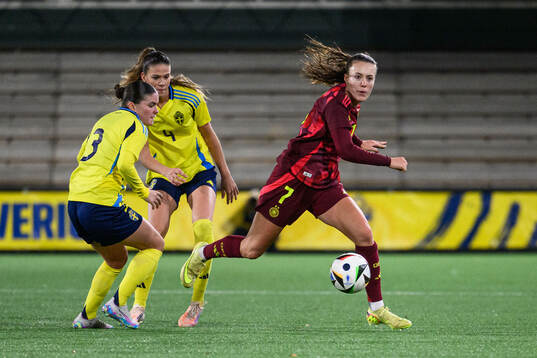 Hanna Wijk and Bella Andersson of Sweden and Mara Alber of