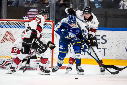 Malmö Redhawks Carl Persson och Leksands Nolan Stevens och