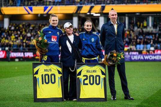 Fridolina Rolfö and Kosovare Asllani of Sweden together