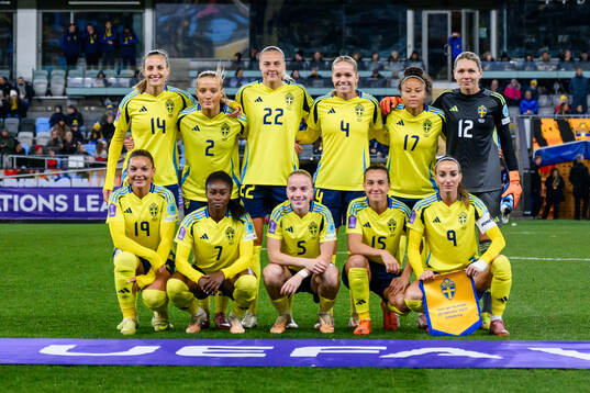 The starting eleven of Sweden pose for a photo