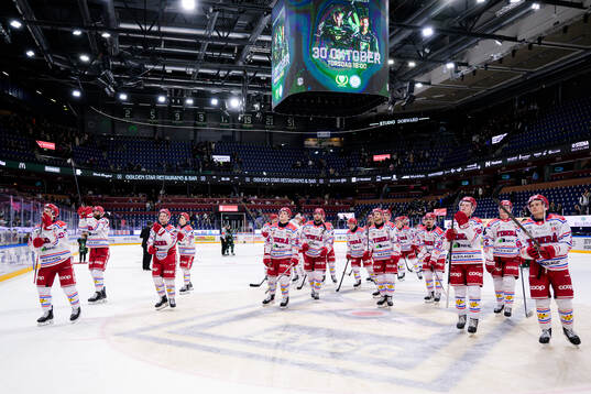 Timrås spelare jublar