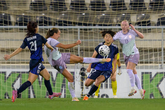 Guro Reiten and Thea Bjelde of Norway against Kiko Seike of