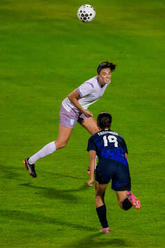 Ingrid Syrstad Engen of Norway and Momoko Tanikawa of Japan