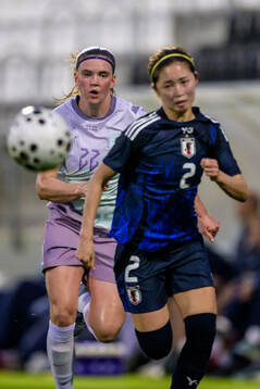 Signe Gaupset of Norway and Risa Shimizu of Japan