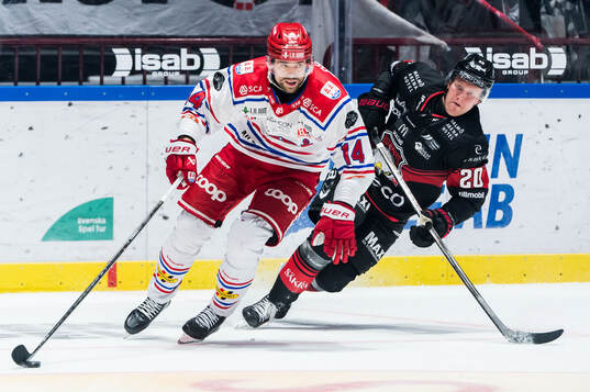 Timrås Emil Pettersson och Malmö Redhawks Thomas Berg