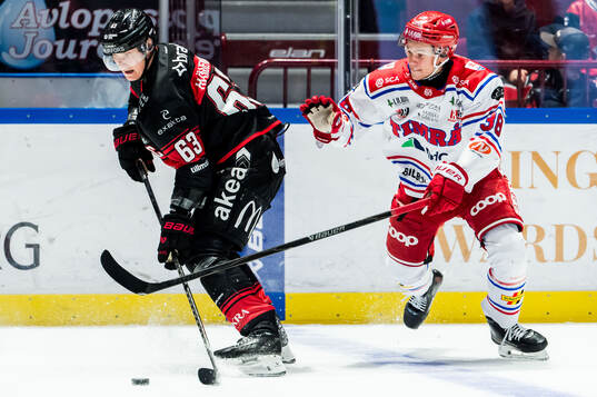 Malmö Redhawks Fredrik Händemark och Timrås Albin Sundin