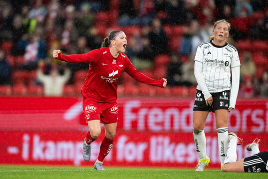 Signe Gaupset of Brann celebrates and Andrea Buberg of