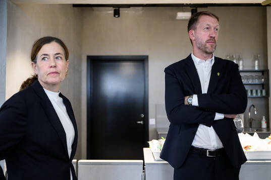 Press officer Petra Thorén and head coach Graham Potter of