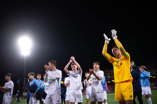 Goalkeeper Viacheslav Surkis of Dynamo Kyiv celebrate