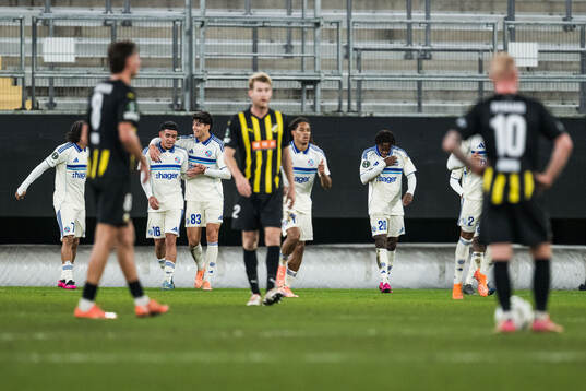Martial Godo of Strasbourg celebrates with team mates