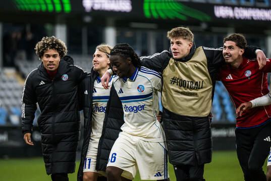 Sebastian Nanasi and Ismael Doukoure of Strasbourg celebrate