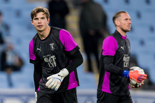 Goalkeeper Melker Ellborg and goalkeeper Robin Olsen of