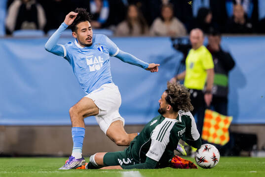 Adrian Skogmar of Malmö FF and Ahmed Touba of Panathinaikos