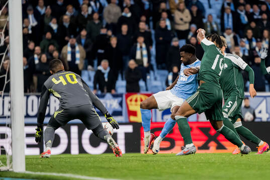 goalkeeper Alban Lafont of Panathinaikos and Emmanuel Ekong